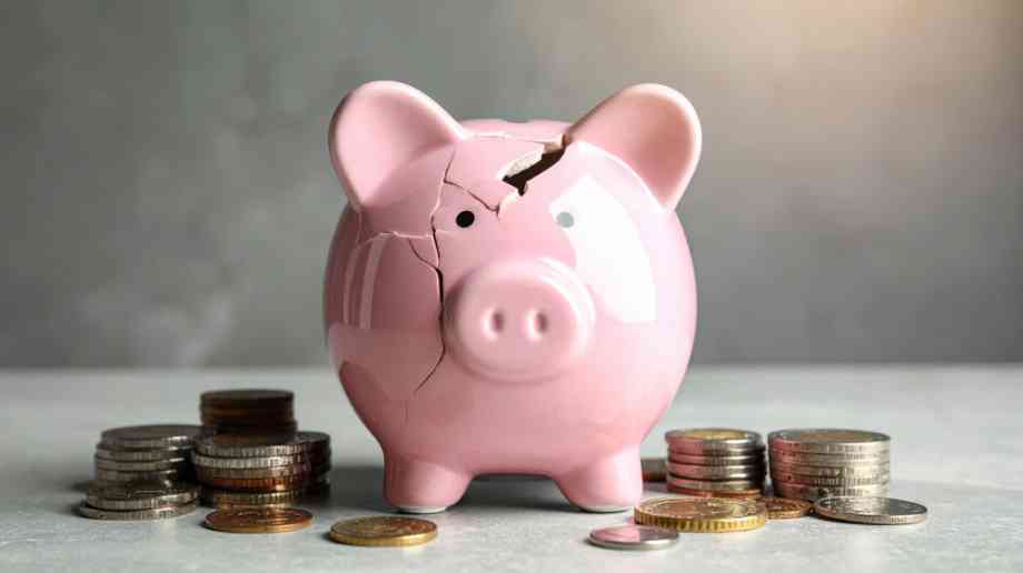 Piggy bank with crack Piggy bank with crack