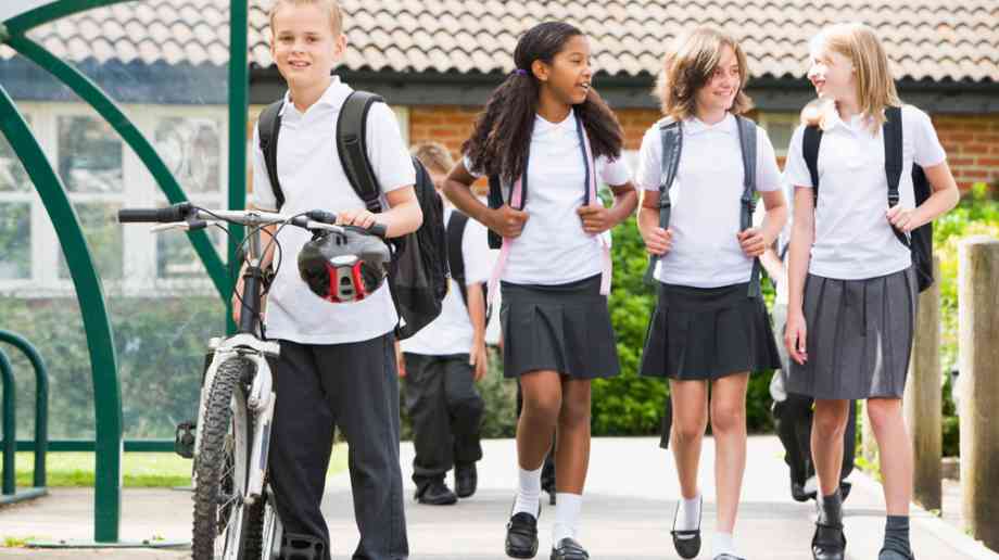 School children walking and cycling home from school.