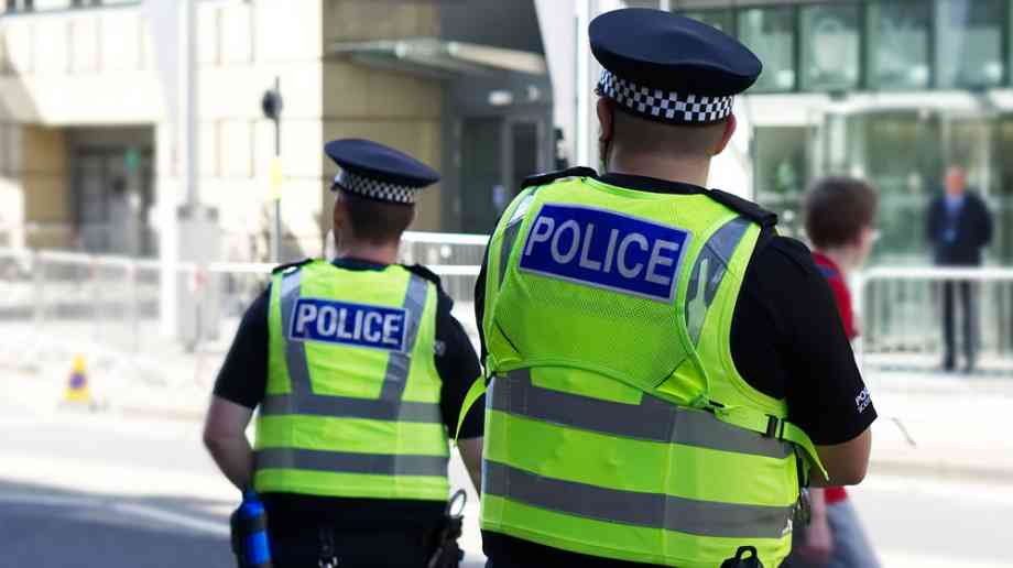 Two police officers on duty in the city centre.