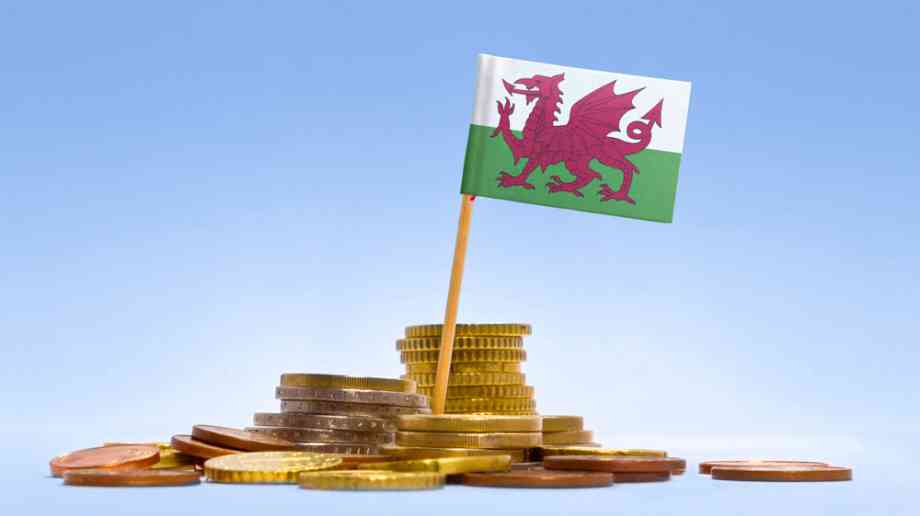Welsh flag on stack of coins
