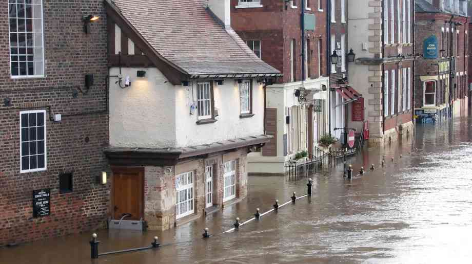 A flooded town high street.